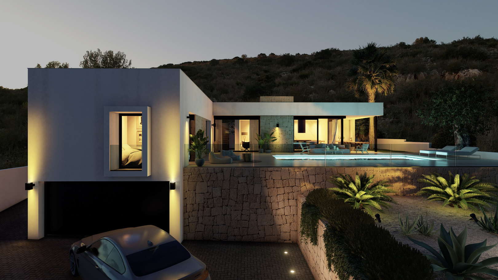 Vista exterior de una villa moderna al anochecer con piscina infinita, muros de piedra y garaje integrado. La iluminación resalta las líneas arquitectónicas y el jardín.