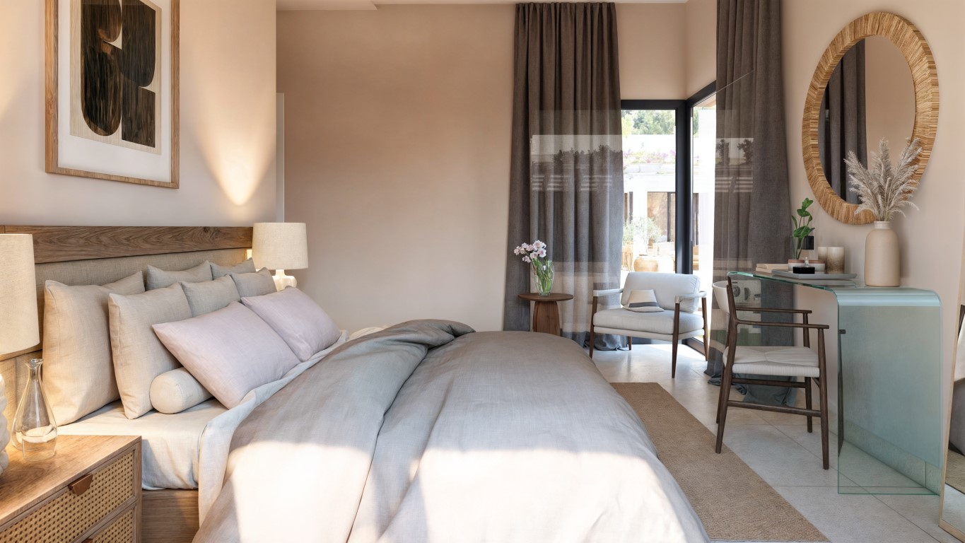Dormitorio luminoso con cabecero de madera, escritorio de cristal y acceso directo a la terraza. Destacan los tonos neutros y el mobiliario de diseño contemporáneo.