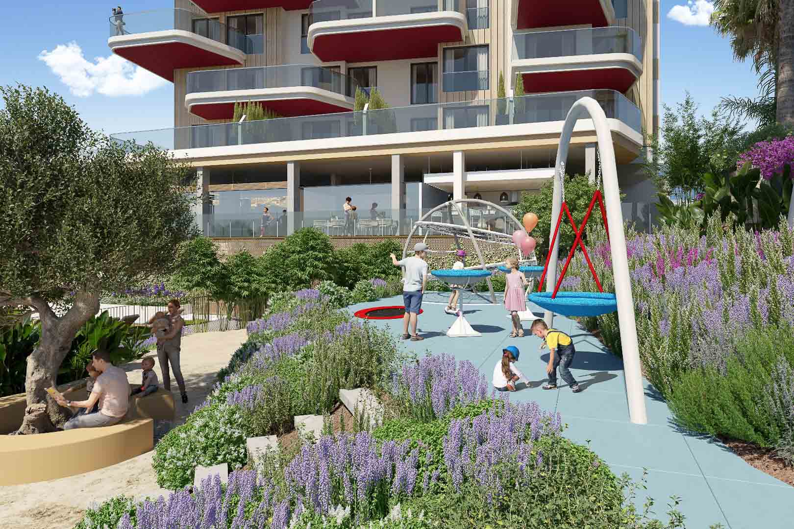 Zona de juegos infantiles con pavimento de seguridad azul y equipamiento moderno, integrada en jardines mediterráneos frente a la fachada de balcones curvos.