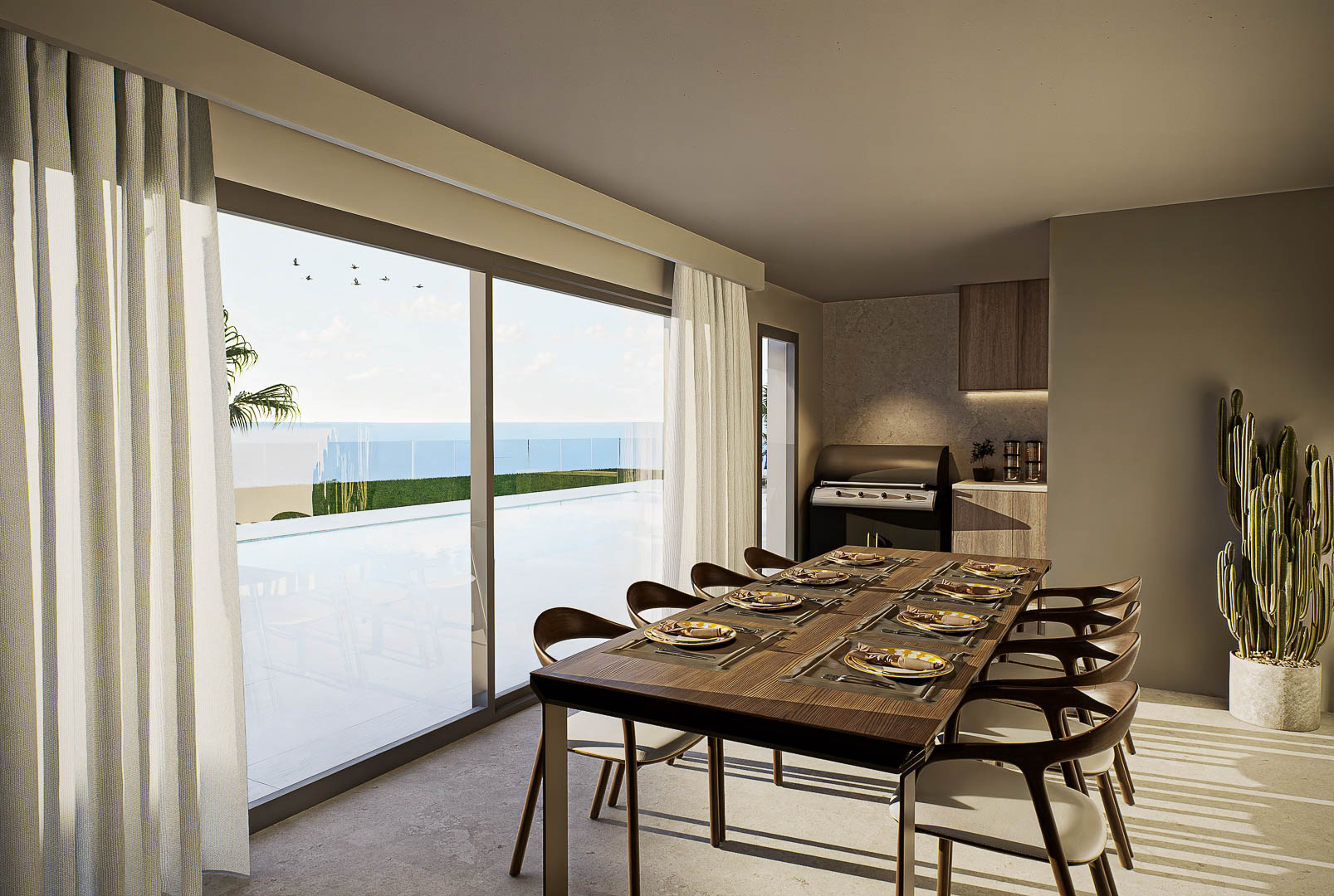 Comedor elegante con mesa de madera y sillas de diseño, integrado con el exterior mediante grandes ventanales que ofrecen vistas a la piscina y al mar.