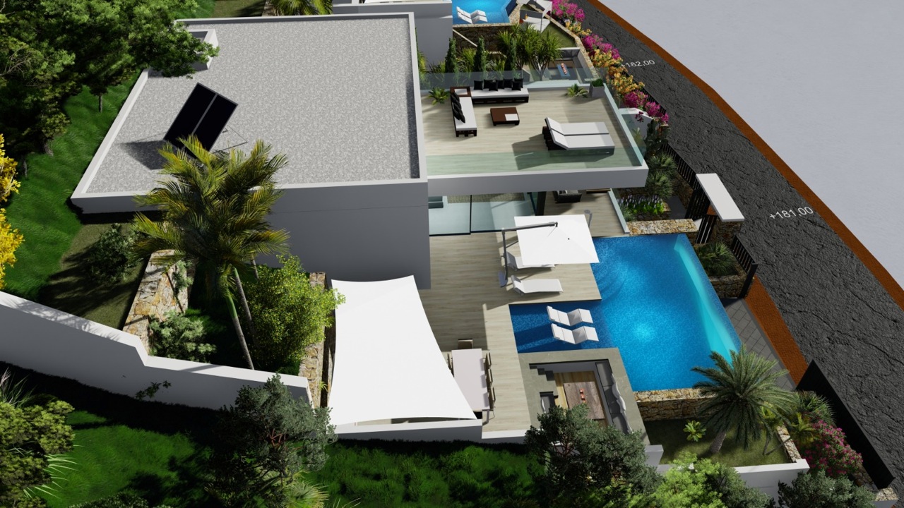 Vista aérea de la villa con piscina infinita, terraza superior con mobiliario y zona ajardinada.