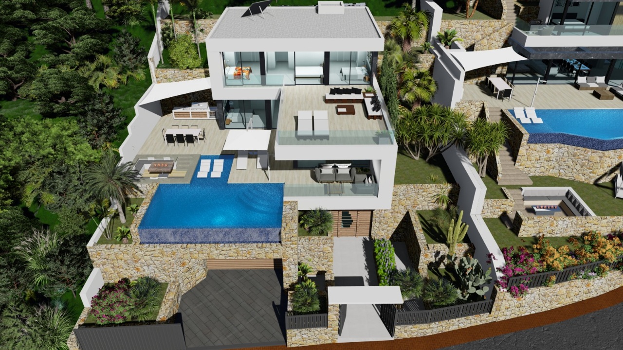 Vista aérea de la villa con piscina infinita y terrazas amuebladas.