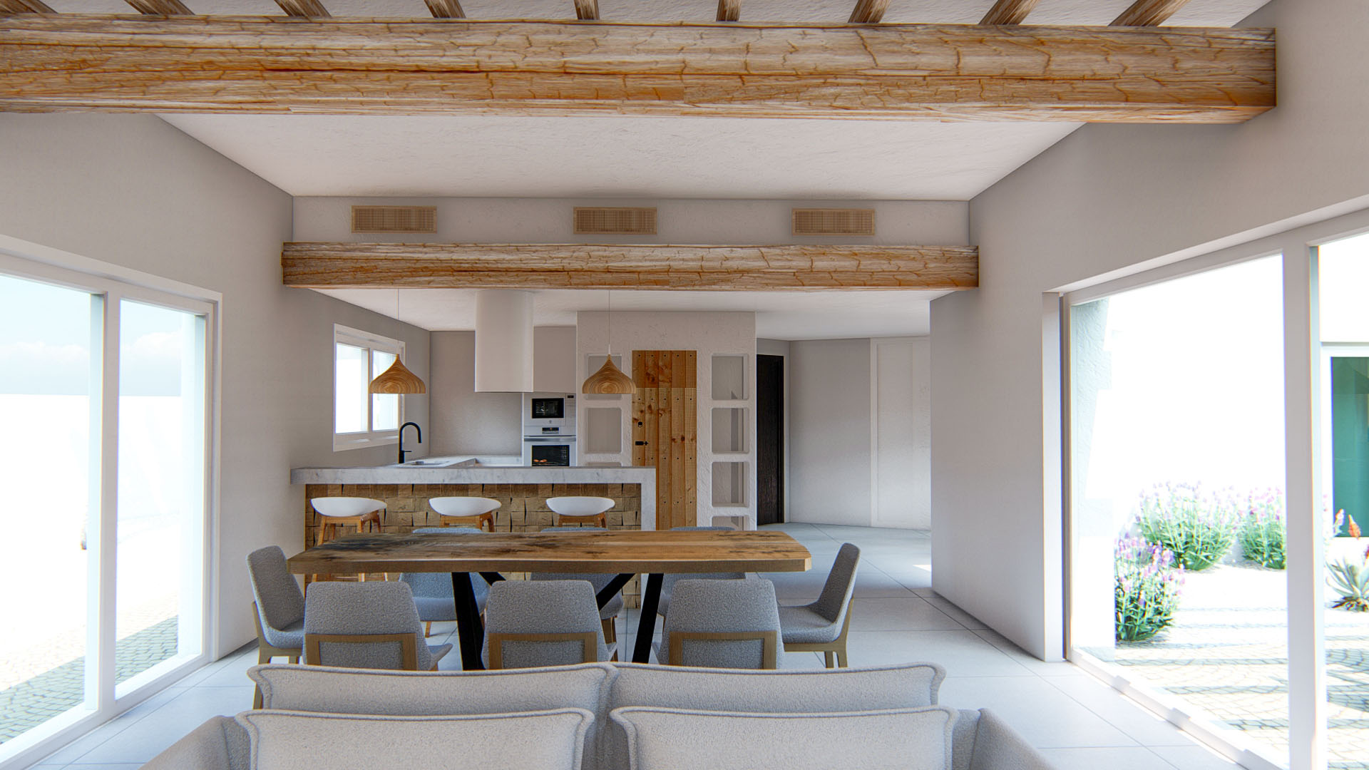 Salón-comedor de planta abierta con vigas de madera vista, cocina integrada con isla y amplios ventanales que conectan con el exterior.