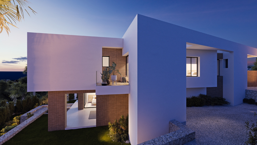 Fachada moderna al atardecer con volúmenes blancos, detalles de ladrillo visto y balcones de cristal integrados en el paisaje mediterráneo.