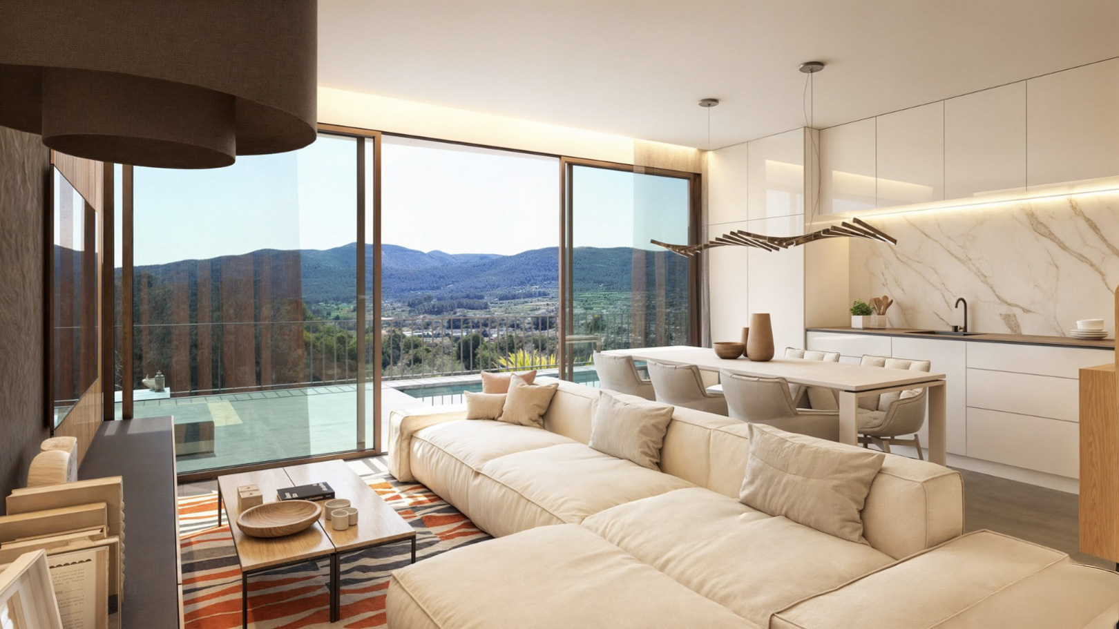 Salón-comedor de concepto abierto con cocina integrada, grandes ventanales correderos y vistas panorámicas a las montañas del Valle de Pop.