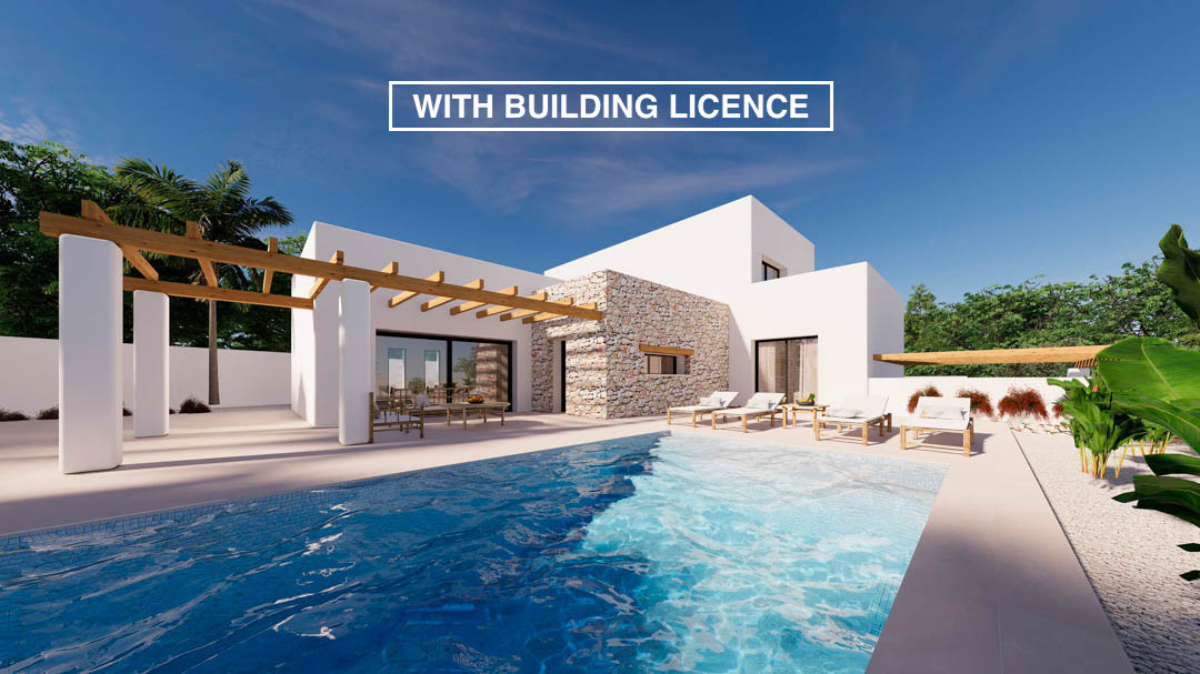 Exterior de villa estilo ibicenco con piscina privada, fachada de piedra natural y pérgola de madera sobre terraza con tumbonas.