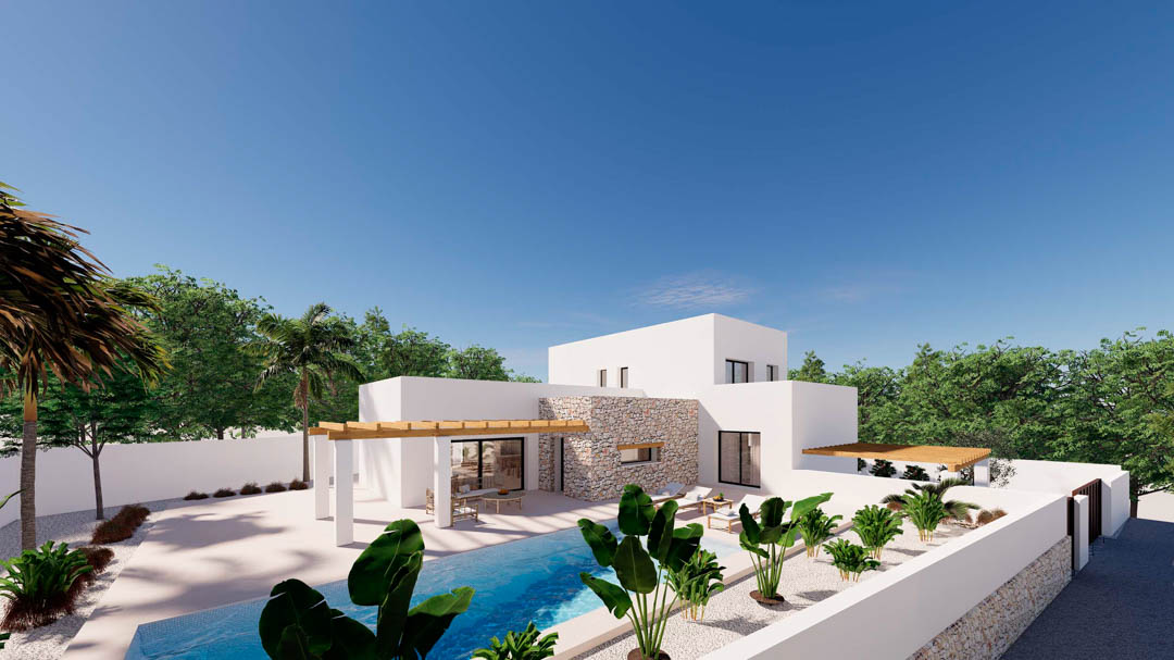 Vista exterior de la villa con fachada blanca, detalles en piedra natural, piscina rectangular y zona de terraza sombreada por pérgolas de madera.