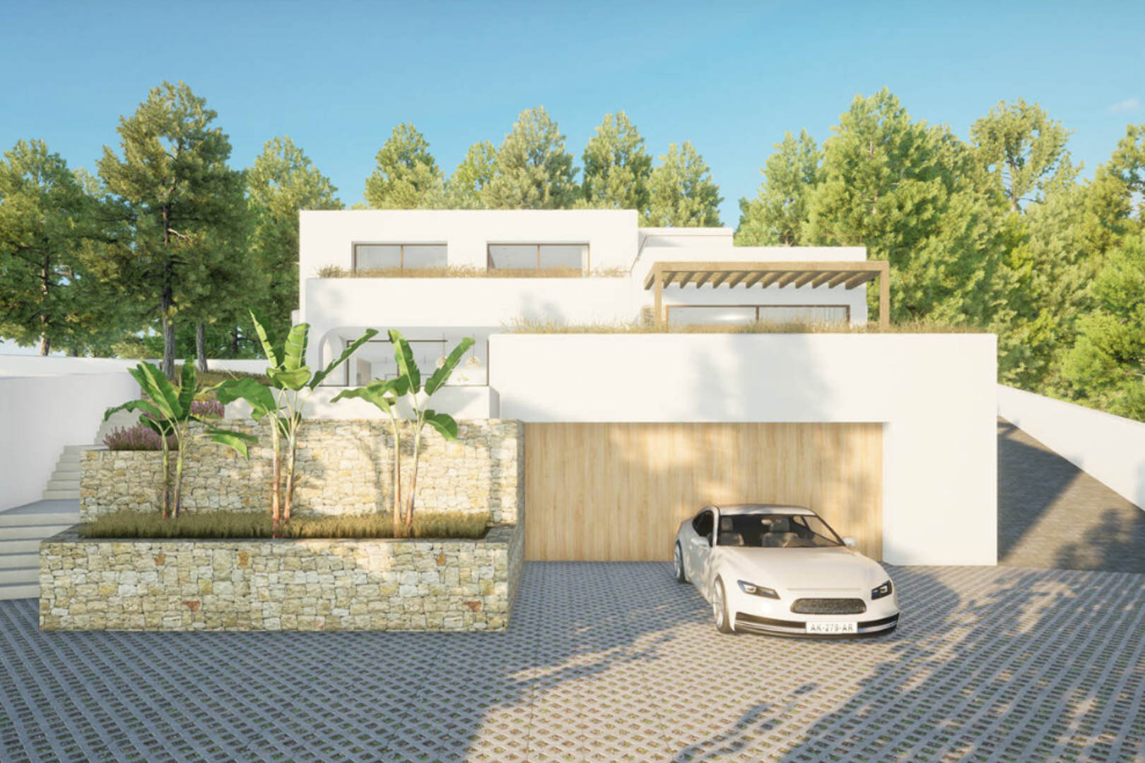 Vista exterior de la villa con fachada blanca, garaje de madera y jardín de piedra con vegetación.