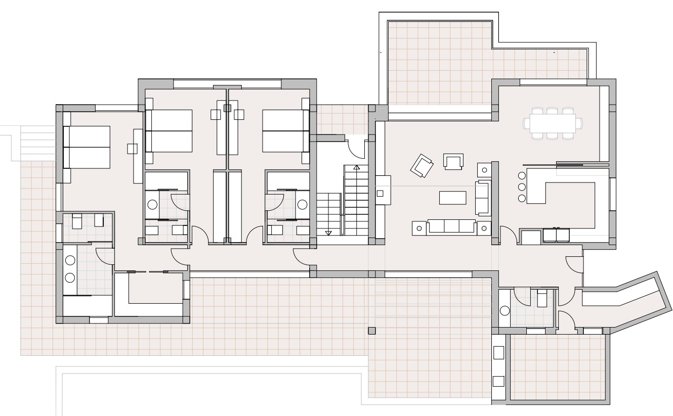 Plano detallado de la planta baja que muestra el salón-comedor diáfano, cocina integrada, tres dormitorios con baños en suite y amplias zonas de terraza exterior.