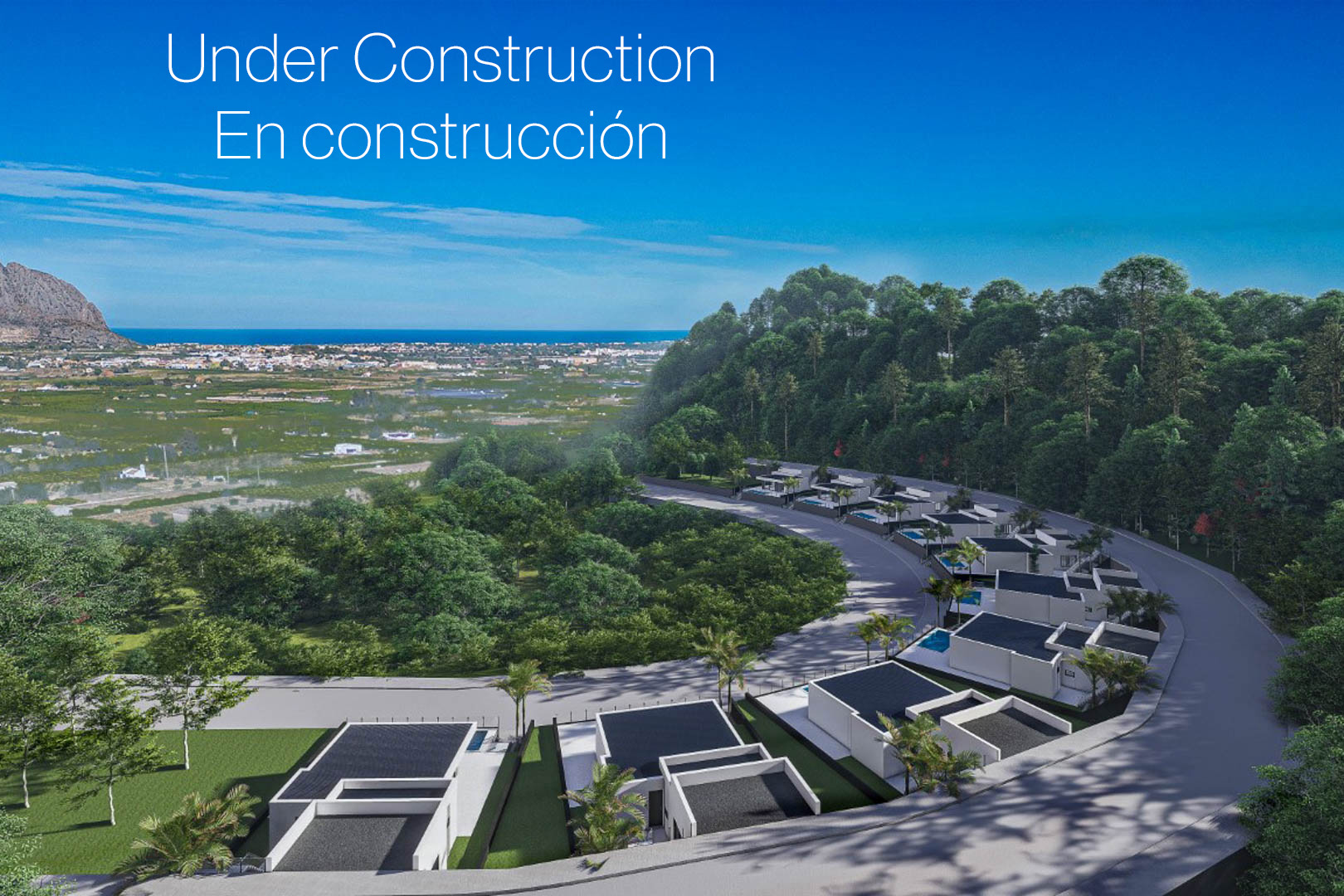 Vista aérea del complejo residencial en Monte Solana, mostrando villas de diseño moderno integradas en la ladera con vistas panorámicas al valle y al mar Mediterráneo.