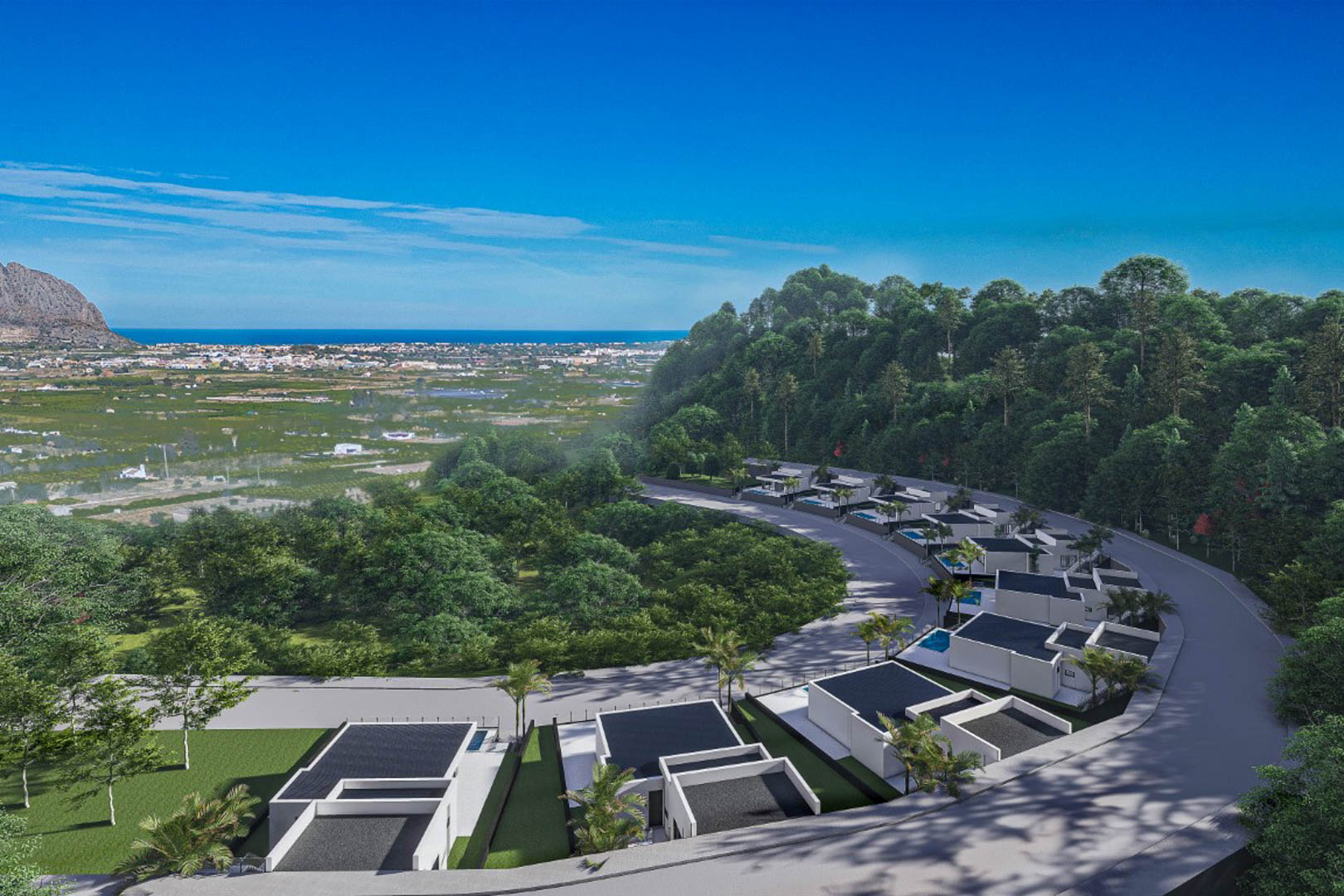 Vista aérea del conjunto residencial en Monte Solana, mostrando villas de diseño moderno integradas en la ladera con vistas panorámicas al valle y al mar Mediterráneo.