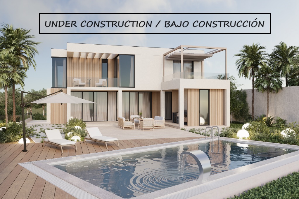 Vista de la villa en Calpe con piscina, tumbonas y comedor exterior. Diseño moderno y jardines exuberantes.