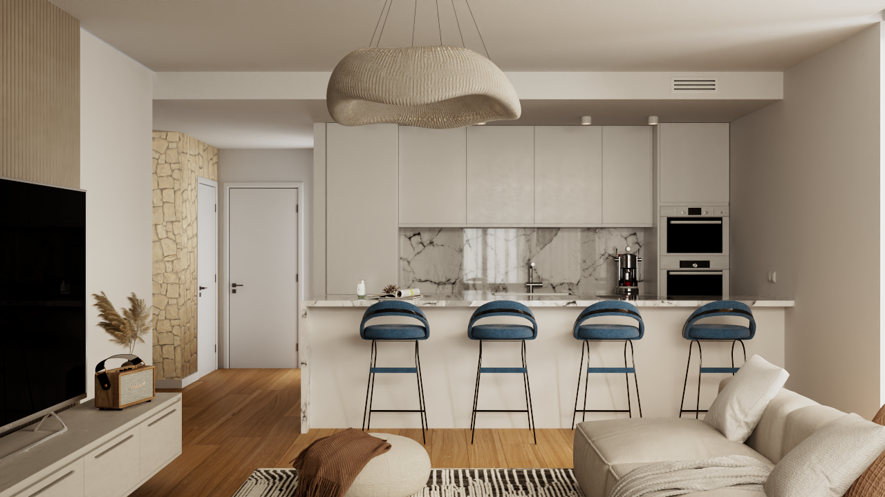 Cocina abierta con isla de mármol, taburetes azules y electrodomésticos integrados, conectada a un salón con suelos de madera y una pared de piedra natural.