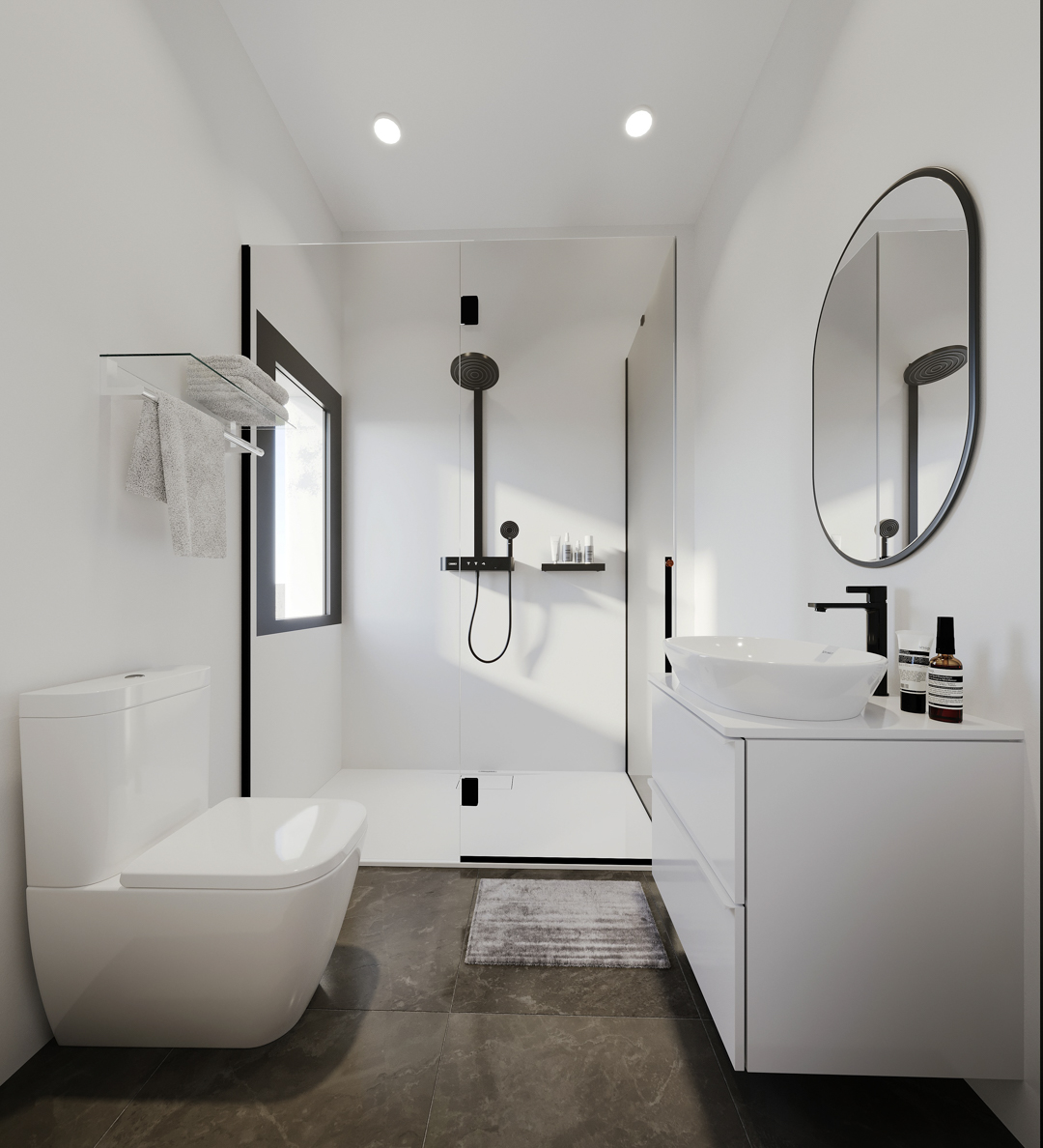 Baño moderno con ducha a ras de suelo, grifería negra mate, lavabo sobre encimera y suelo porcelánico oscuro en contraste con paredes blancas.