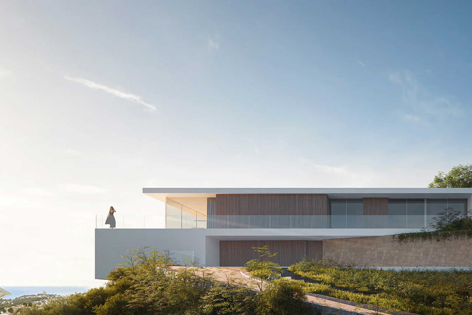 Fachada exterior de diseño vanguardista con voladizos, paneles de madera y muros de piedra natural, ofreciendo una terraza con vistas panorámicas al mar.