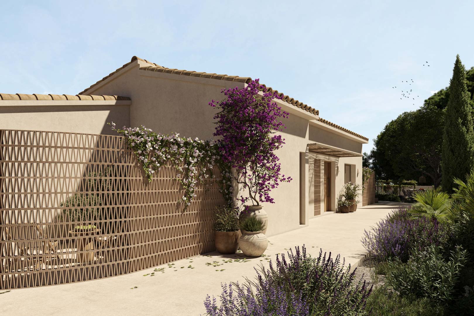 Fachada de estilo mediterráneo con celosía decorativa, buganvillas en macetas de barro y un sendero pavimentado rodeado de vegetación autóctona y lavanda.
