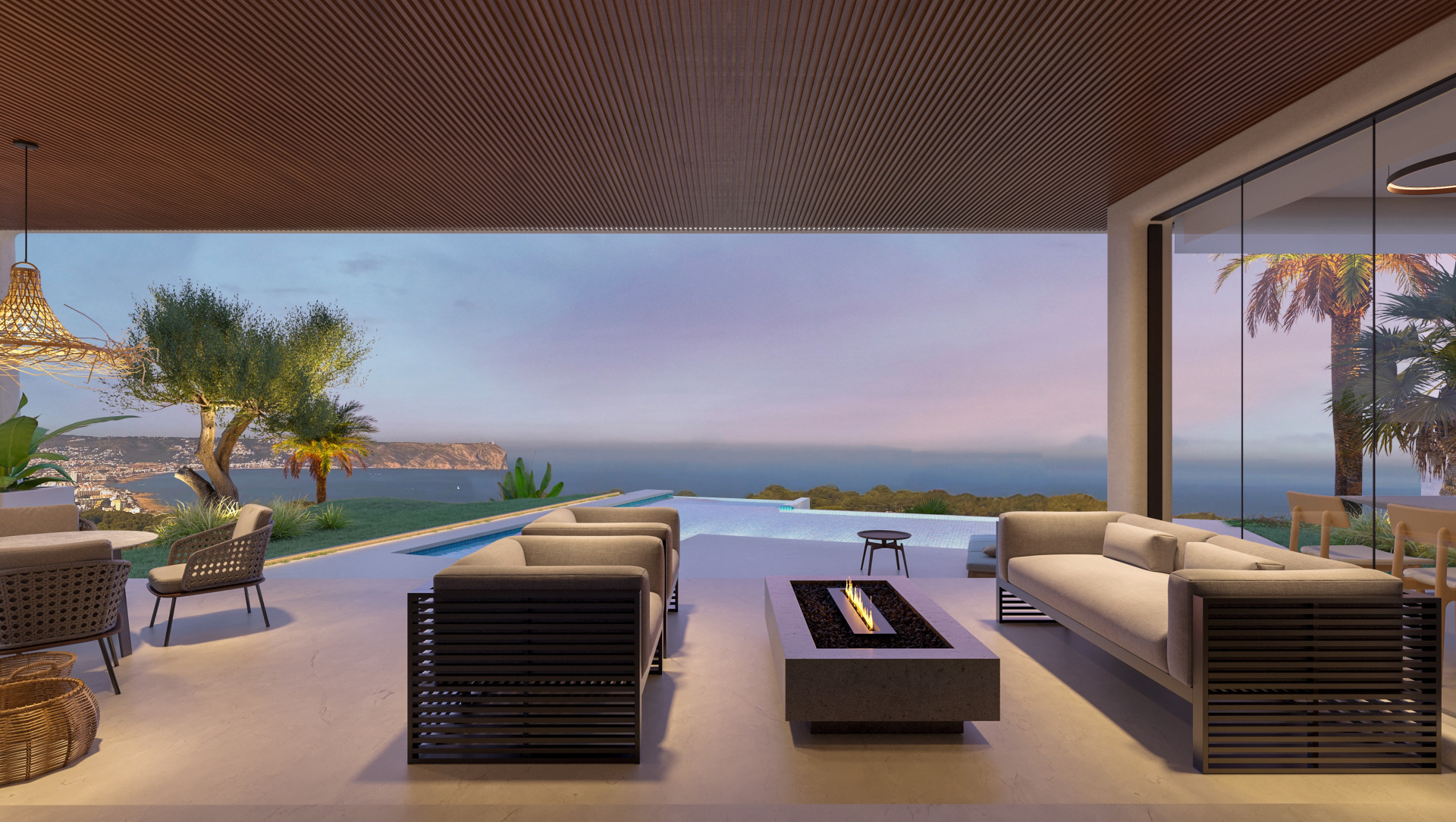 Terraza con vistas al mar y piscina infinita, mobiliario de exterior moderno y chimenea baja.