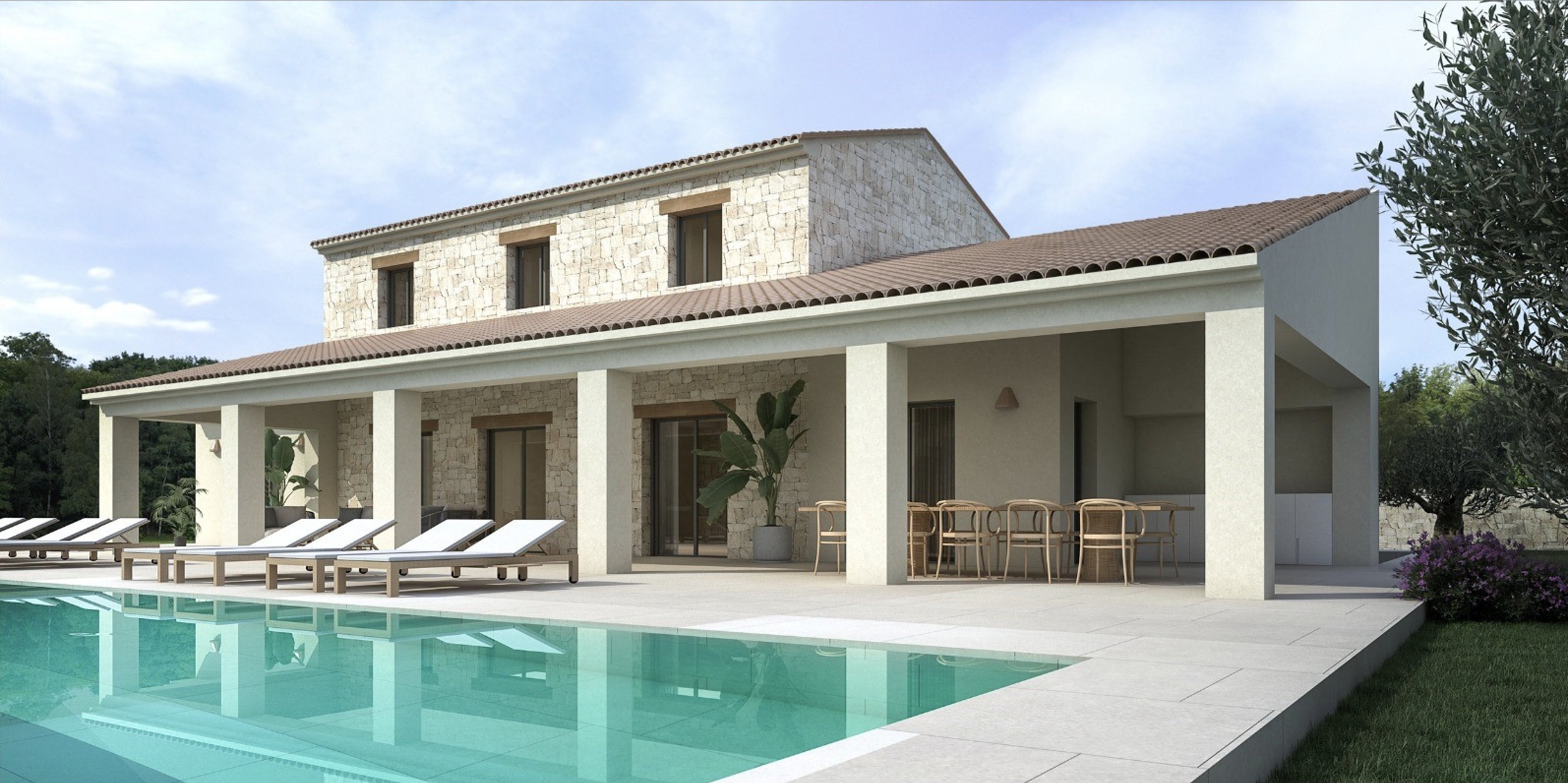 Exterior de villa mediterránea con fachada de piedra natural, amplia terraza cubierta con zona de comedor y piscina rodeada de tumbonas sobre pavimento cerámico.
