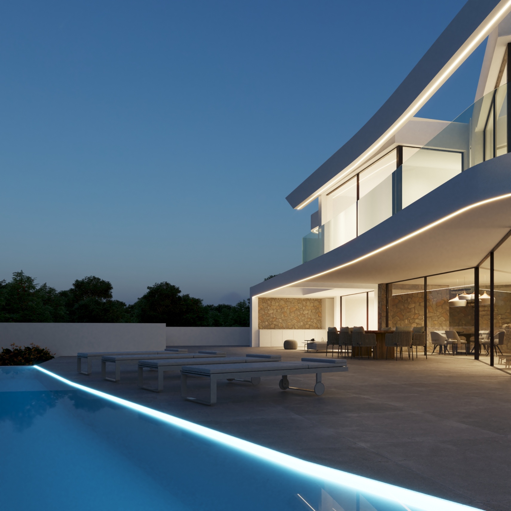 Terraza exterior con piscina infinita iluminada por LED, zona de comedor bajo voladizo y fachada moderna con muros de piedra natural y grandes ventanales.