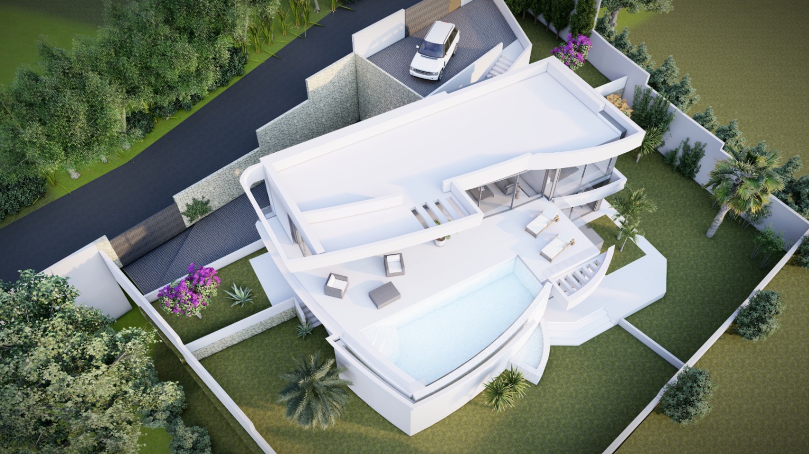 Vista aérea de la villa que destaca su diseño geométrico blanco, piscina infinita curva, terrazas con mobiliario exterior y parcela perimetrada con jardines y zona de acceso.