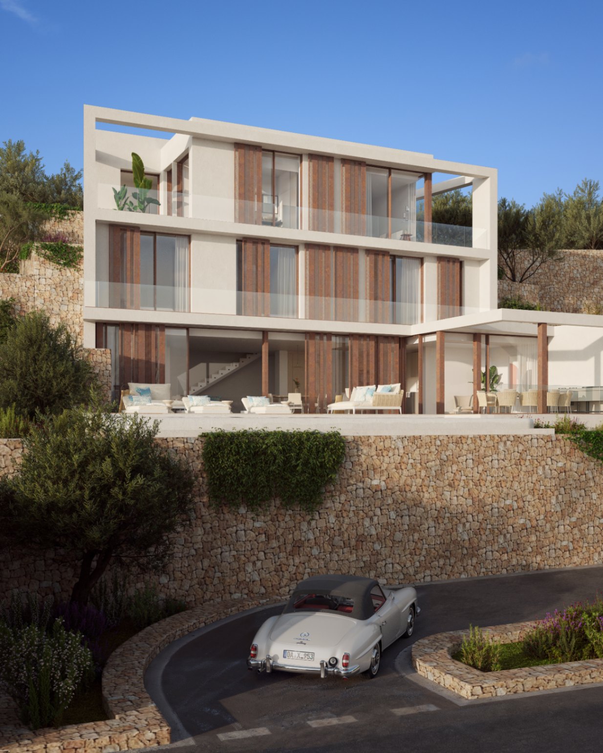 Fachada de tres niveles con muros de piedra natural, persianas de madera y amplias terrazas. El diseño integra ventanales de suelo a techo y una zona exterior con mobiliario de diseño.
