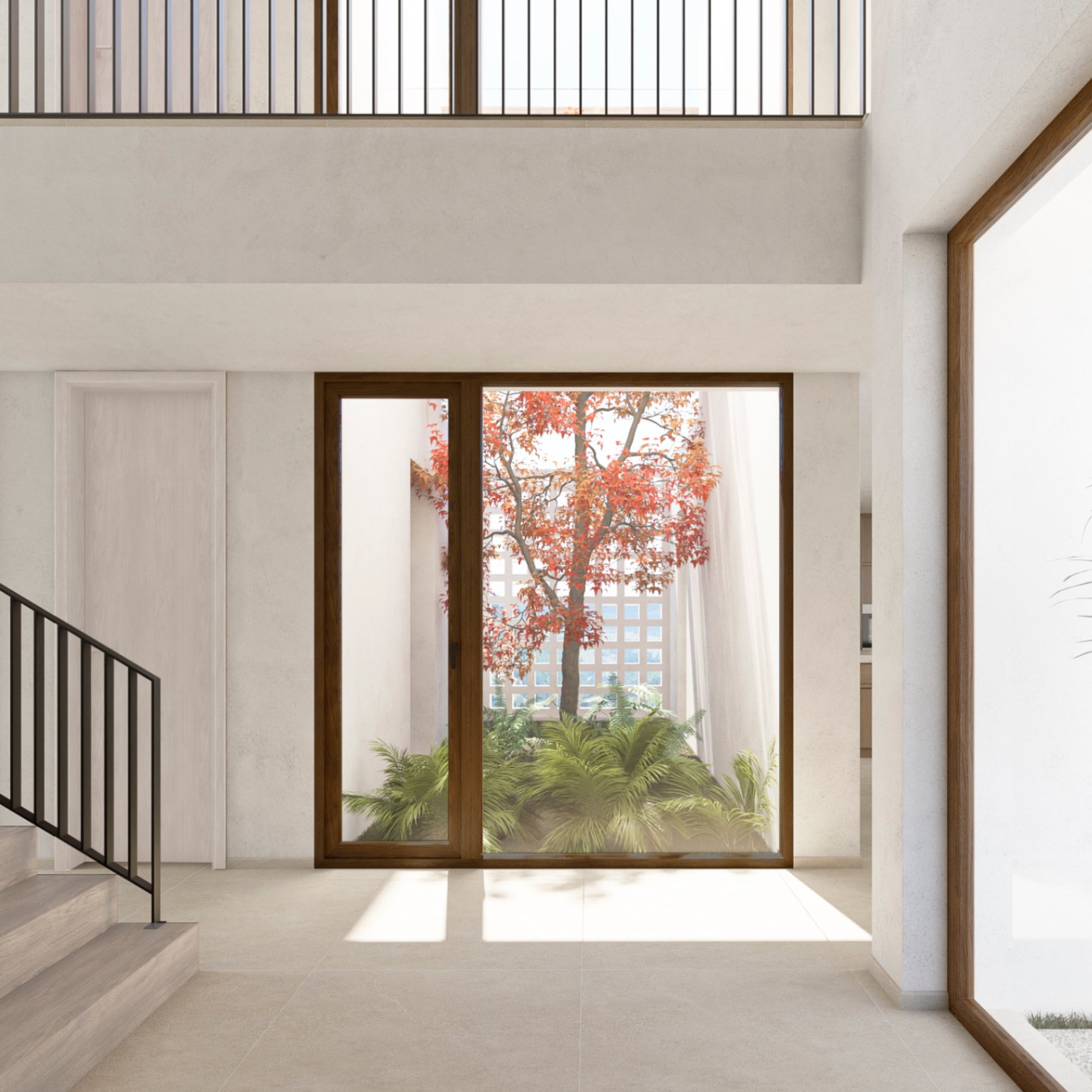 Vista interior de la villa con escalera de madera y ventana al jardín interior con árbol de hojas rojizas.
