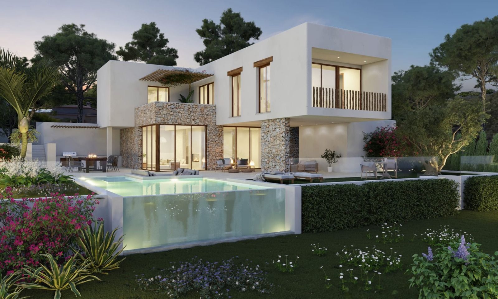 Villa de estilo ibicenco con fachada de piedra natural y piscina de pared de cristal integrada en un jardín mediterráneo iluminado.