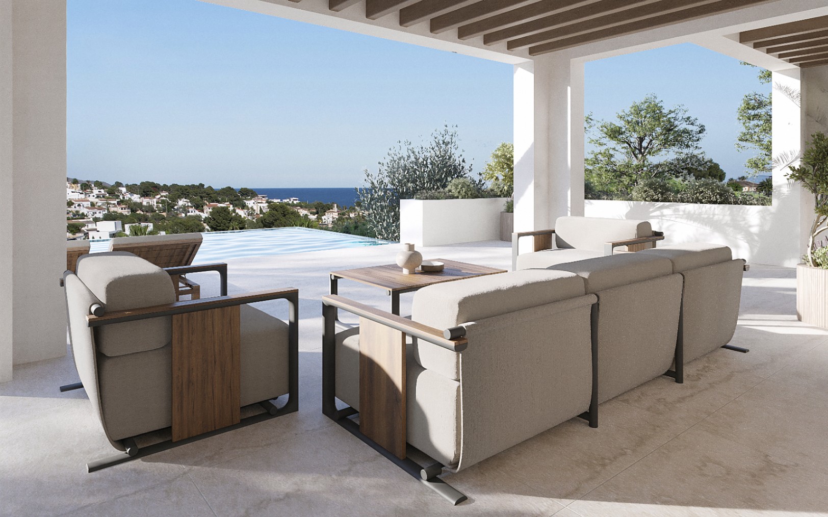 Terraza cubierta con vistas al mar y mobiliario de diseño moderno.