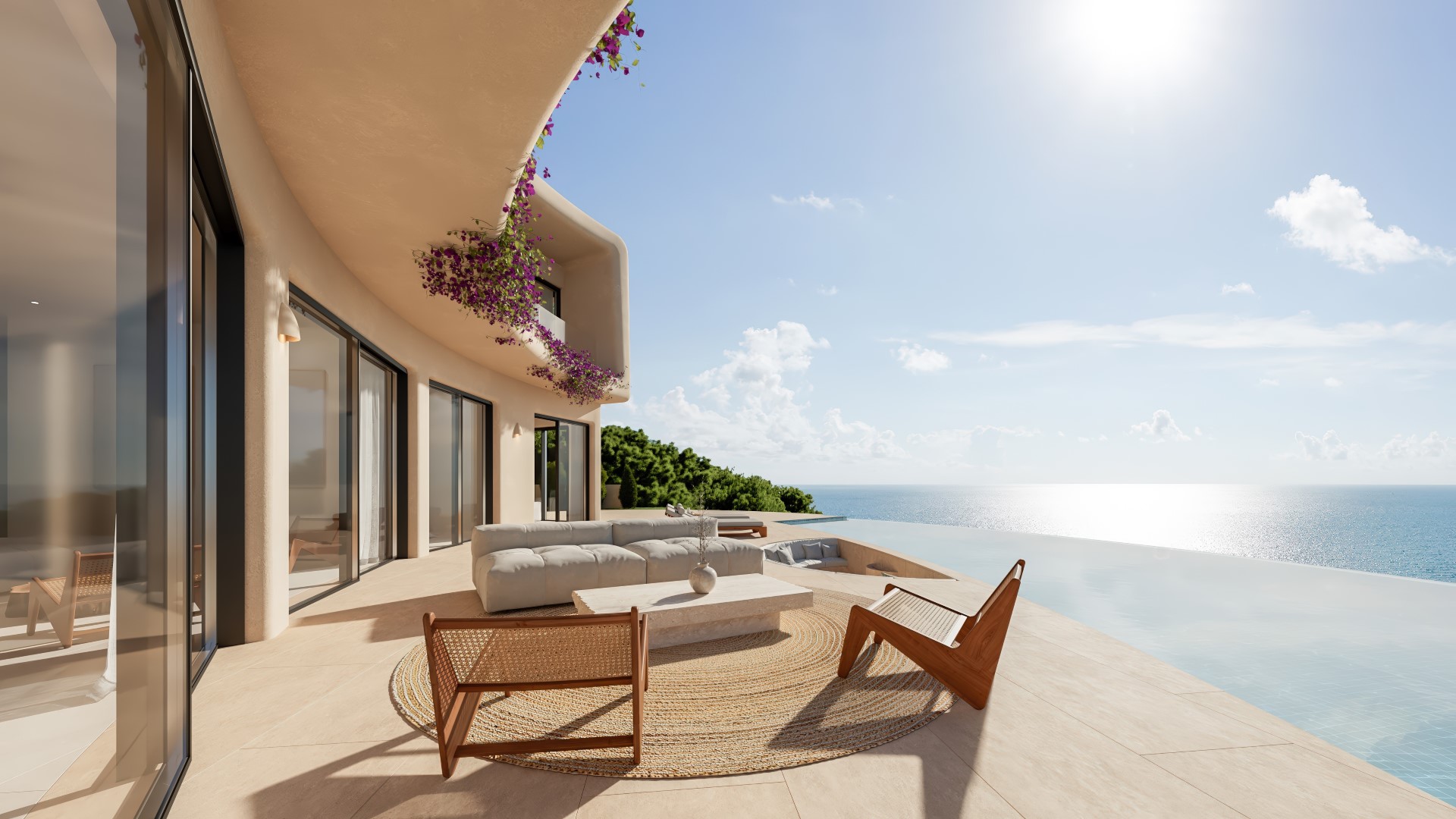 Terraza principal con piscina infinita y vistas al Mediterráneo. Mobiliario de diseño sobre alfombra de yute y arquitectura de líneas curvas con buganvilias.