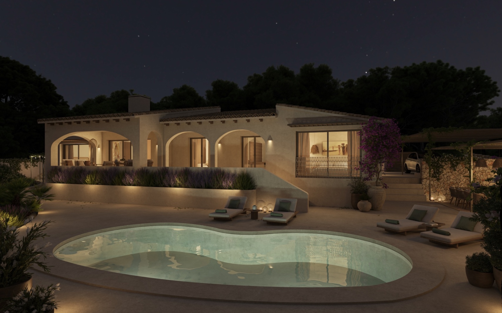 Vista exterior nocturna de la villa con piscina de diseño libre, porches de arcos iluminados y jardines integrados bajo un cielo estrellado.
