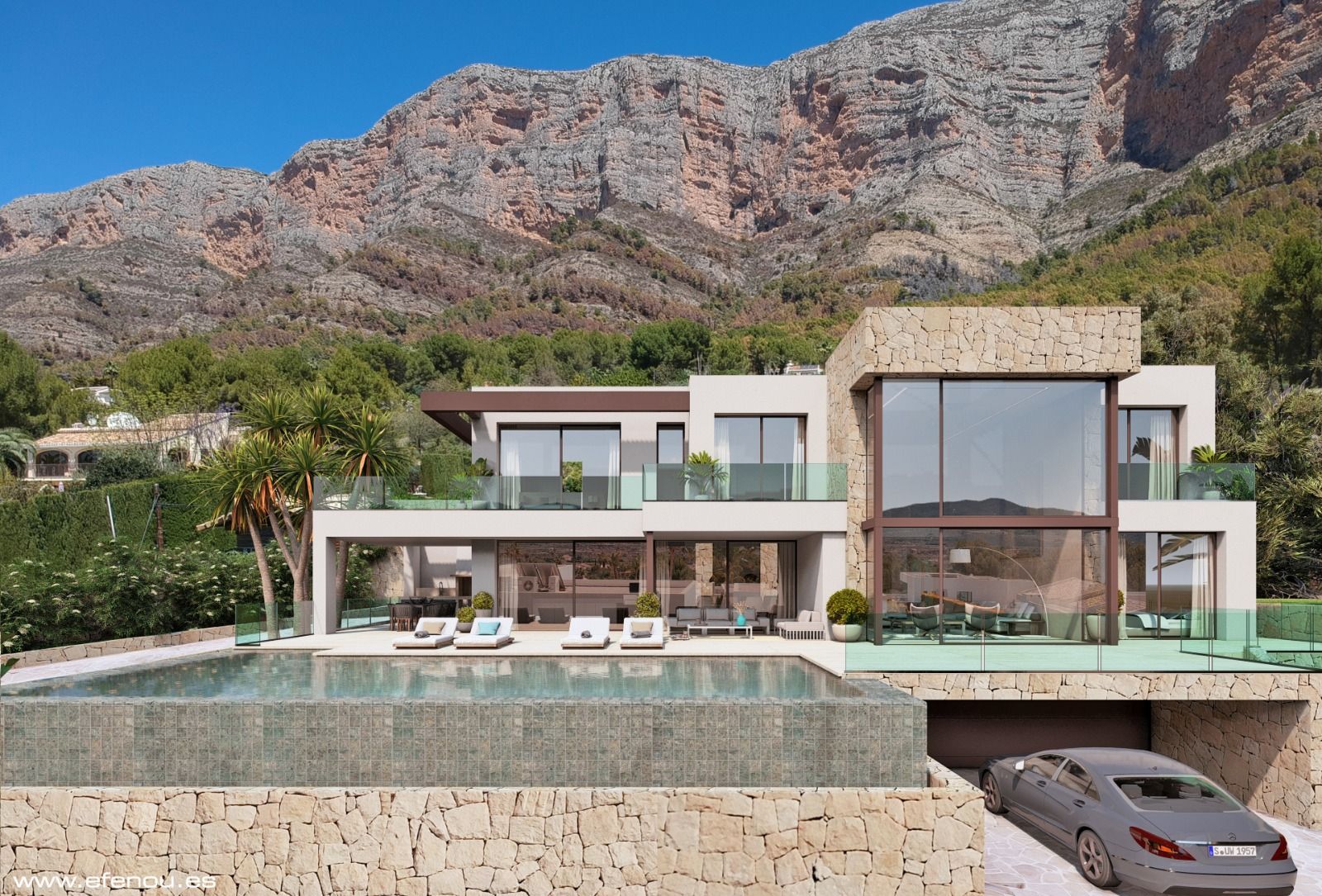Fachada de estilo moderno con muros de piedra natural, piscina infinita y amplios ventanales de doble altura frente al macizo del Montgó en Jávea.