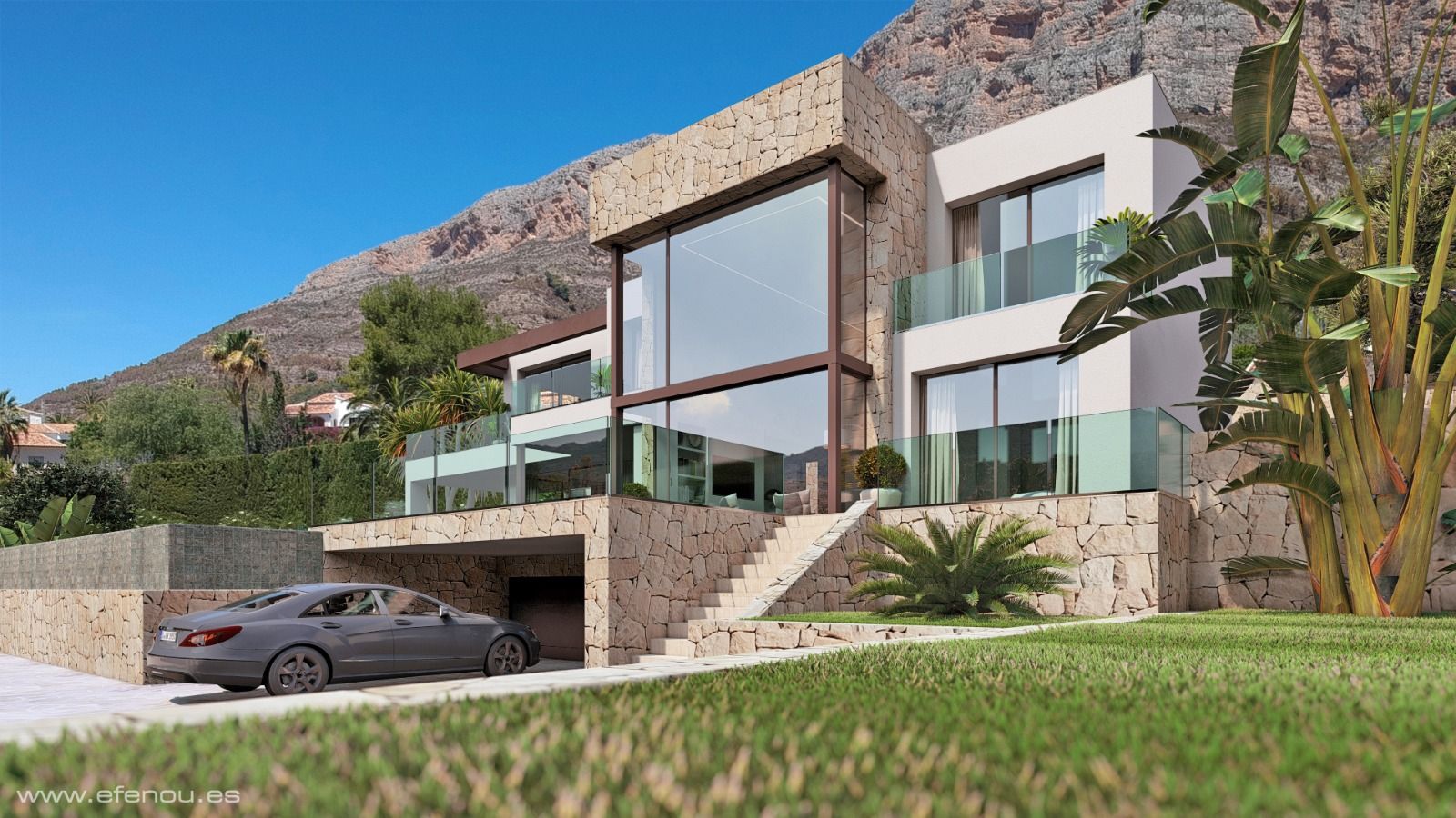 Fachada moderna con ventanales de doble altura, muros de piedra natural y barandillas de cristal, situada a los pies del macizo del Montgó en Jávea.