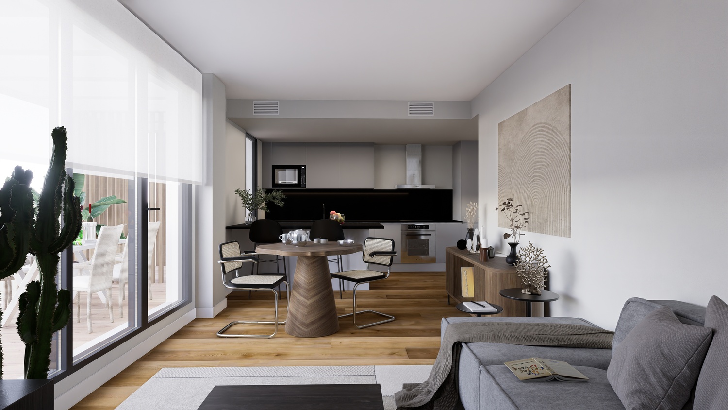 Espacio diáfano con cocina moderna de tonos grises, comedor con mesa de madera y suelos de roble. Grandes ventanales conectan el salón con la terraza exterior.