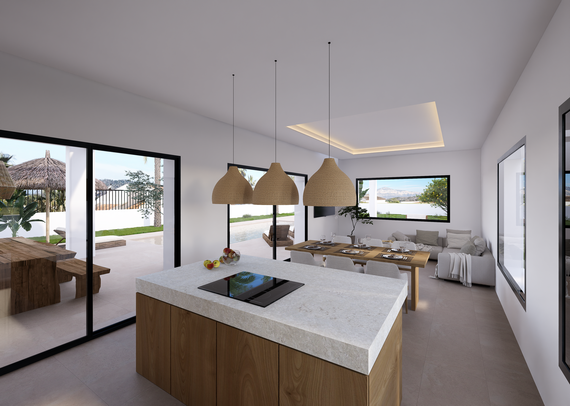 Zona diáfana que integra cocina con isla de piedra y madera, comedor y salón con techo foseado, conectando al exterior mediante amplios ventanales correderos.