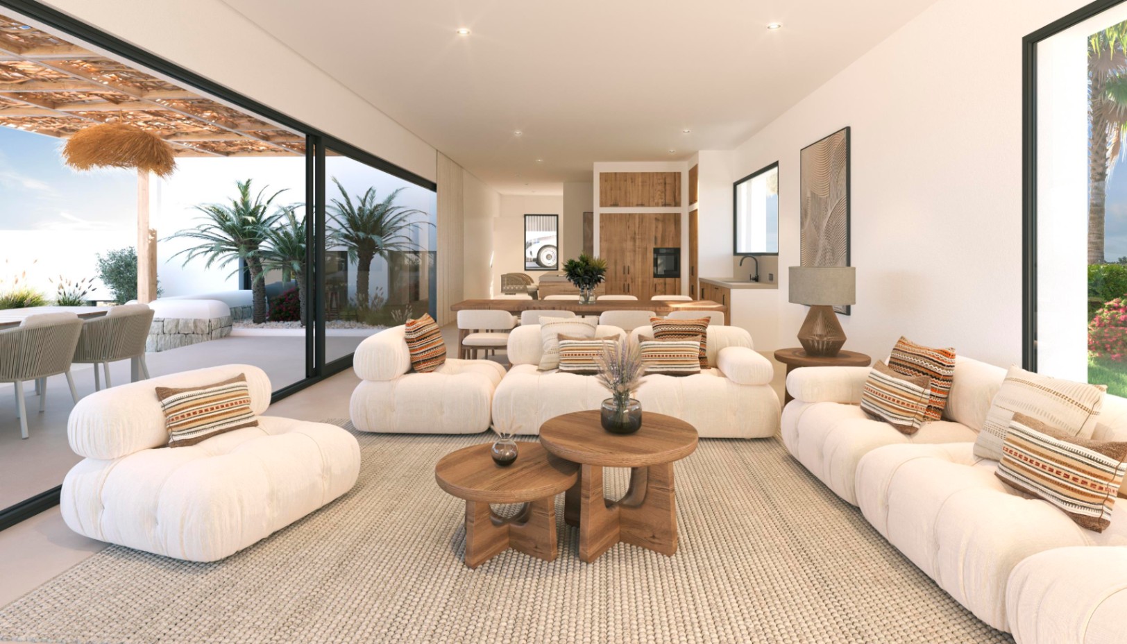 Salón de concepto abierto con sofás modulares blancos y mesas de madera, integrado con el exterior mediante grandes ventanales correderos hacia la terraza.