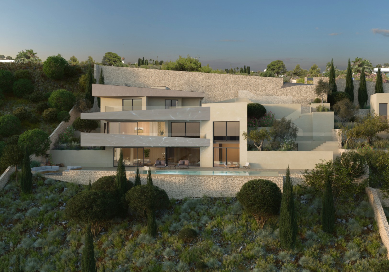 Vista exterior de la villa en Benissa. Diseño moderno con piscina y amplias terrazas integradas en el paisaje.