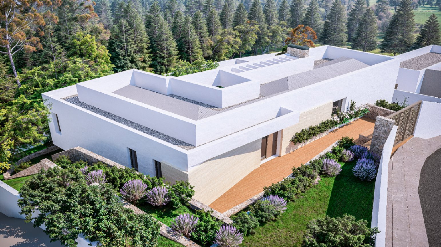 Vista aérea de la arquitectura moderna con líneas rectas, fachadas blancas y muros de piedra natural, rodeada de un jardín mediterráneo con lavanda y pinos.
